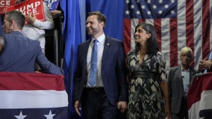 Republican vice presidential nominee Sen. JD Vance, R-Ohio, arrives with his wife Usha Vance, before speaking at a campaign event, Tuesday, Sept. 17, 2024 in Eau Claire, Wis. (AP Photo/Abbie Parr)