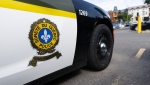 A Quebec provincial police car is seen at their headquarters in Montreal, Tuesday, Sept. 10, 2024. Three men injured after assailant enters Quebec mosque west of Montreal. THE CANADIAN PRESS/Christinne Muschi