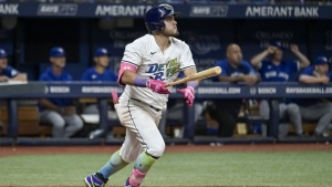 Tampa Bay Rays first base Jonathan Aranda (62) hits a solo home run to right center field off Toronto Blue Jays starter José Berríos during the sixth inning of a baseball game, Friday, Sept. 20, 2024, in St. Petersburg, Fla. (AP Photo/Steve Nesius)