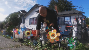 Tim Joseph decorates his yard to brighten up the days of passersby. 