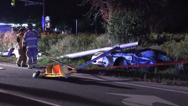 Police and firefighters are pictured at the scene of a serious crash near Major MacKenzie Drive and Highway 48 in Markham Friday September 21st 2024. 