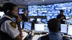 Security Inspector Malinda Mccormack speaks on the phone during a tour of the UN Security Operations Center inside the United Nations Headquarters, Friday Sept. 20, 2024. (AP Photo/Stefan Jeremiah)