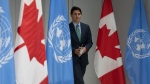 Prime Minister Justin Trudeau makes his way to the podium for a news conference at the Canadian Permanent Mission, in New York, Thursday, Sept. 21, 2023. THE CANADIAN PRESS/Adrian Wyld