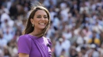 Kate, Princess of Wales waits to present the trophy to Carlos Alcaraz of Spain after he defeated Novak Djokovic of Serbia in the men's singles final at the Wimbledon tennis championships in London, July 14, 2024. (AP Photo/Kirsty Wigglesworth, File)