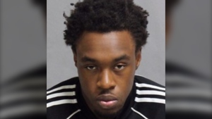 Carlton Malcolm, 25, is pictured in this police handout photo. (Handout /Toronto police)