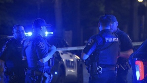 This image provided by WBMA shows police working on the scene of a shooting in Birmingham, Ala., Sunday, Sept. 22, 2024. (Bill Castle/WBMA via AP)