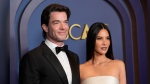 FILE - John Mulaney, left, and Olivia Munn arrive at the Governors Awards, Jan. 9, 2024, at the Dolby Ballroom in Los Angeles. (AP Photo/Chris Pizzello, File)