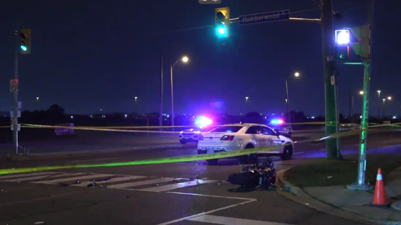 A driver and a motorcyclist are receiving treatment at the hospital after colliding on Sept. 22 in north Etobicoke. (Jacob Estrin/CTV News Toronto)