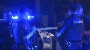 This image shows police working on the scene of a shooting in Birmingham, Ala., Sunday, Sept. 22, 2024. (Bill Castle/WBMA via AP)