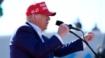 Republican presidential nominee former President Donald Trump speaks at a campaign rally at Wilmington International Airport, Saturday, Sept. 21, 2024, in Wilmington, N.C. (AP Photo/Alex Brandon)