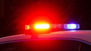 A police car with flashing lights is shown in Philadelphia, Monday, Jan. 17, 2022.THE CANADIAN PRESS/AP-Matt Rourke