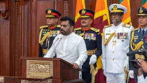 Commanders of the security forces stand behind as Sri Lanka's new president Anura Kumara Dissanayake, addresses a gathering after he was sworn in at the Sri Lankan President's Office in Colombo, Sri Lanka, Monday, Sept.23, 2024. (Sri Lankan President's Office via AP)