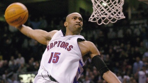 Toronto Raptors' Vince Carter jams during second half NBA action against the Cleveland Cavaliers in Toronto Wednesday Jan. 7, 2004. The Raptors beat the Cavaliers 75-69. (CP PHOTO/Aaron Harris)