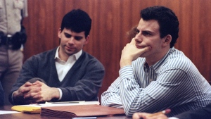 Erik Menendez (R) and brother Lyle listen to court proceedings during a 1991 court appearance. (Lee Celano / Reuters via CNN Newsource)