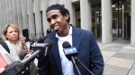 Hassan Ali, who also goes by the stage name "Top 5," is seen outside of a Toronto courthouse on Sept. 23, 2024.