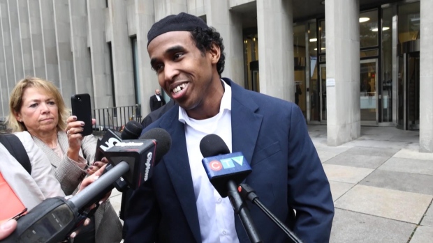 Hassan Ali, who also goes by the stage name "Top 5," is seen outside of a Toronto courthouse on Sept. 23, 2024.