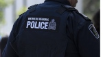 Police in Waterloo Region say they are investigating a crash that killed three people and injured three others. A police officer looks on during an event in Waterloo, Ont., Thursday, June 29, 2023. (THE CANADIAN PRESS/Nicole Osborne)