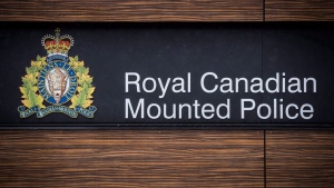 The RCMP logo is seen outside Royal Canadian Mounted Police "E" Division Headquarters, in Surrey, B.C., Friday April 13, 2018. (THE CANADIAN PRESS/Darryl Dyck)