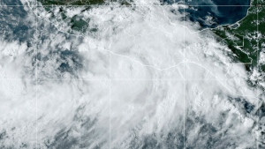 This National Oceanic and Atmospheric Administration satellite image taken at 6:10pm ET shows Hurricane John near southern Mexico on Monday, Sept. 23, 2024. (NOAA via AP)
