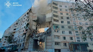 Smoke, dust and debris can be seen after after a Russian attack that hit a residential building in Kharkiv, Ukraine, Tuesday Sept. 24, 2024. (Ukrainian Emergency Services via AP)
