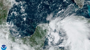 This National Oceanic and Atmospheric Administration satellite image taken at 6:01 pm ET shows Hurricane John near southern Mexico on Tuesday, Sept. 24, 2024. (NOAA via AP)
