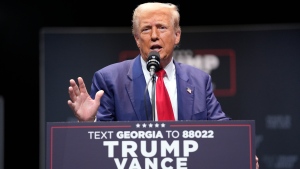 Republican presidential nominee former U.S. President Donald Trump speaks about the tax code and manufacturing at the Johnny Mercer Theatre Civic Center, Tuesday, Sept. 24, 2024, in Savannah, Ga. (Evan Vucci / AP Photo)