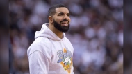 Rapper Drake watches the Toronto Raptors play the Philadelphia 76ers during NBA playoff action in Toronto, Tuesday, May 7, 2019. Toronto rapper Drake will be named songwriter of the year in the performer category at the SOCAN Awards, an industry celebration held Tuesday at Toronto's History venue. THE CANADIAN PRESS/Frank Gunn