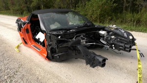 A rare corvette is found in New Lowell, Ont., stripped and surrounded with police tape. (CTV News/Mike Arsalides)