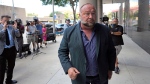 Right-wing conspiracy theorist Alex Jones enters the federal courthouse for a hearing in front of a bankruptcy judge Friday, June 14, 2024, in Houston. (David J. Phillip / The Associated Press)