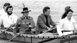 Prime Minister Pierre Trudeau and Communications minister Francis Fox paddle across the Ottawa River from Parliament Hill, Friday May 20, 1983, to the future site of the National Museum Of Man, on the Quebec shores. (CP Photo/Paul Chiasson)