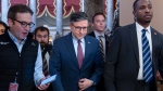 Speaker of the House Mike Johnson walks to the chamber at the Capitol in Washington on Sept. 20, 2024. (J. Scott Applewhite / AP Photo)