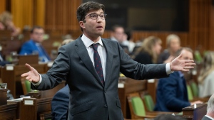 Conservative MP for Sherwood Park-Fort Saskatchewan Garnett Genuis rises in the House of Commons following Question Period as he attempts to explain his comments, Thursday, September 26, 2024 in Ottawa. THE CANADIAN PRESS/Adrian Wyld