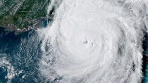 This GOES-16 GeoColor satellite image taken at 5:46 p.m. EDT and provided by National Oceanic and Atmospheric Administration (NOAA) shows Hurricane Helene in the Gulf of Mexico moving towards Florida, Thursday, Sept. 26 2024. (NOAA via AP)