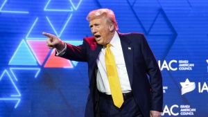 Republican presidential nominee former U.S. president Donald Trump acknowledges the crowd after speaking at the Israeli American Council National Summit, Thursday, Sept. 19, 2024, in Washington. (AP Photo/Evan Vucci)