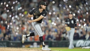 Chicago White Sox pitcher Fraser Ellard throws warmup pitches during the seventh inning of a baseball game against the Detroit Tigers, Friday, Sept. 27, 2024, in Detroit. (AP Photo/Carlos Osori