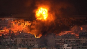 Flames rise after an Israeli airstrike in the southern suburbs of Beirut, Lebanon, Saturday, Sept. 28, 2024. (AP Photo/Hussein Malla)