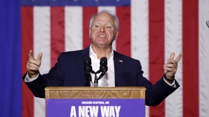 Democratic vice presidential candidate Minnesota Gov. Tim Walz speaks at the Whitewater Music Hall Brewing Company Friday, Sept. 13, 2024, in Wausau, Wis. (AP Photo/Morry Gash)