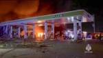 Saturday, Sept. 28, 2024, firefighters respond after an explosion killed multiple people at a gas station in the suburbs of Dagestan capital Makhachkala in Russia's Caspian Sea region (Russian Emergency Ministry Press Service via AP)