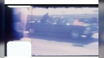 FILE - An undated image released by RR Auction shows home film footage of President John F. Kennedy's motorcade speeding down a Dallas freeway to the hospital after he was fatally wounded on Nov. 22, 1963. (RR Auction via AP, File)