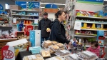 People shop inside the Northern Store where most groceries and goods are purchased in Nain, N.L., on May 12, 2023. A mother in a community where the cost of living is one of the highest in the country says grocery prices are “inhumane” and retailers are putting profits ahead of people’s basic human right to food. THE CANADIAN PRESS/Darren Calabrese