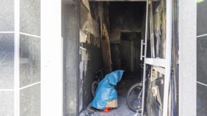 This photo shows a stairwell of a residential building after a fire in Essen, Germany Sunday, Sept. 29, 2024. (Thomas Banneyer/dpa via AP)
