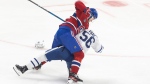 Montreal Canadiens' Arber Xhekaj (top) starts a fight with Toronto Maple Leafs' Cedric Pare (56) during first period NHL pre-season action in Montreal, Saturday, Sept. 28, 2024. THE CANADIAN PRESS/Evan Buhler