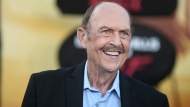 FILE - John Ashton arrives at the premiere of "Beverly Hills Cop: Axel F" on June 20, 2024, in Beverly Hills, Calif. (Photo by Richard Shotwell/Invision/AP, file)