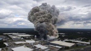 Smoke billows from a fire at the BioLab facility in Conyers, Ga., Sunday, Sept. 29, 2024. (Ben Gray/Atlanta Journal-Constitution via AP)