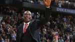 Retired Denver Nuggets center Dikembe Mutombo waves to the crowd as his jersey number was retired by the team during halftime of the Nuggets' NBA basketball game against the Portland Trail Blazers on Saturday, Oct. 29, 2016, in Denver. (AP Photo/David Zalubowski, File)