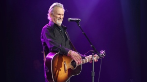 FILE - Artist and songwriter Kris Kristofferson performs "Sunday Morning Coming Down" at the Nashville Songwriters Association International "50 Years of Songs" at the Ryman Auditorium, Sept. 20, 2017, in Nashville, Tenn. (Photo by Laura Roberts/Invision/AP, File)