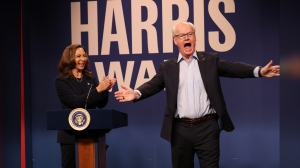 This image released by NBC shows Maya Rudolph as Kamala Harris, left, and Jim Gaffigan as Tim Walz, during the cold open sketch on "Saturday Night Live" in New York on Saturday, Sept. 28, 2024. (Will Heath/NBC via AP)