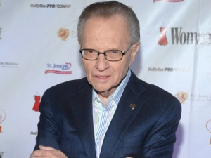 In this Feb. 11, 2009 file photo, TV Personality Larry King attends the Woman's Day 6th annual "Red Dress Awards" benefiting The Larry King Cardiac Foundation in New York. (AP Photo/Peter Kramer, file)