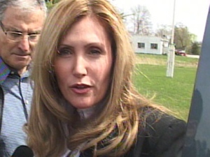 Helena Guergis speaks to reporters after a riding association meeting in New Lowell, Ont., on Saturday, April 24, 2010.