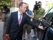 Michael Bryant leaves Old City Hall court in Toronto on Tuesday May 25, 2010. The Crown has withdrawn charges against Bryant in death of a cyclist. Bryant was charged last August with criminal negligence causing death and dangerous driving in the death of bike courier Darcy Allan Sheppard. (THE CANADIAN PRESS/Frank Gunn)